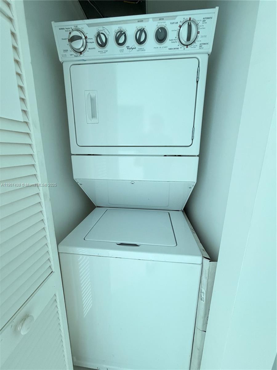 2641 North Flamingo Road, Unit 2208N Sunrise, FL 33323 - Photo 34 of 56 a utility room with dryer and washer