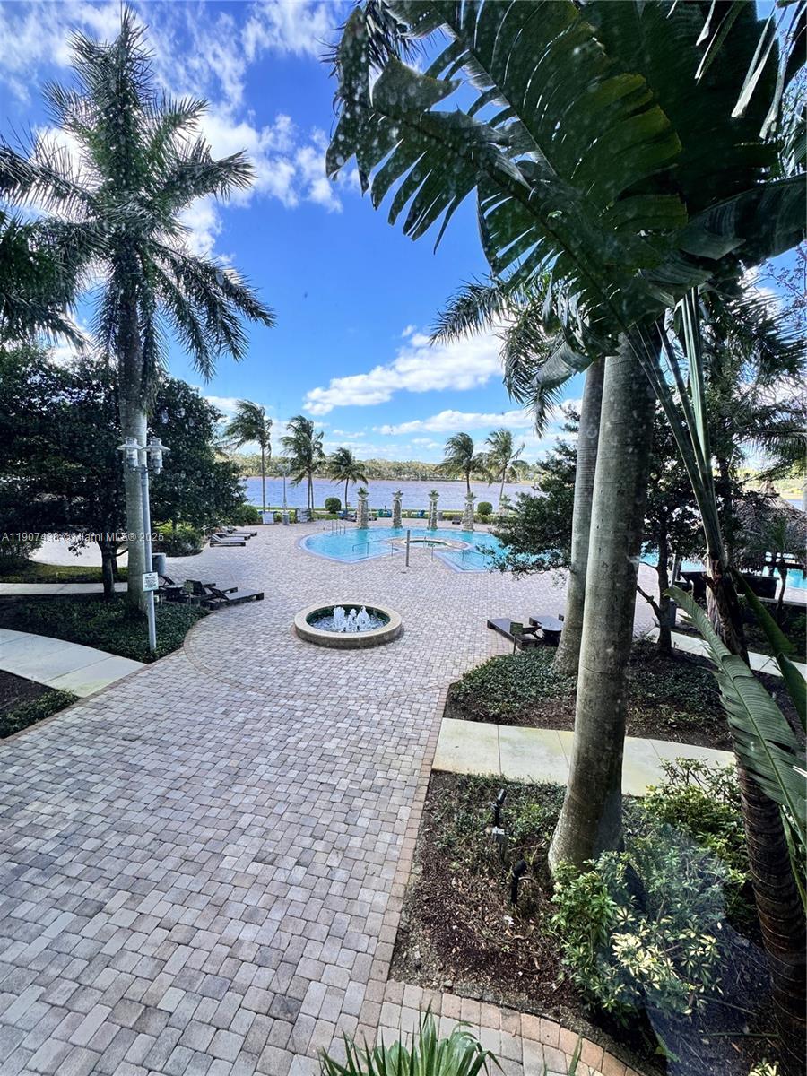 2641 North Flamingo Road, Unit 2208N Sunrise, FL 33323 - Photo 36 of 56 a view of a street with a yard