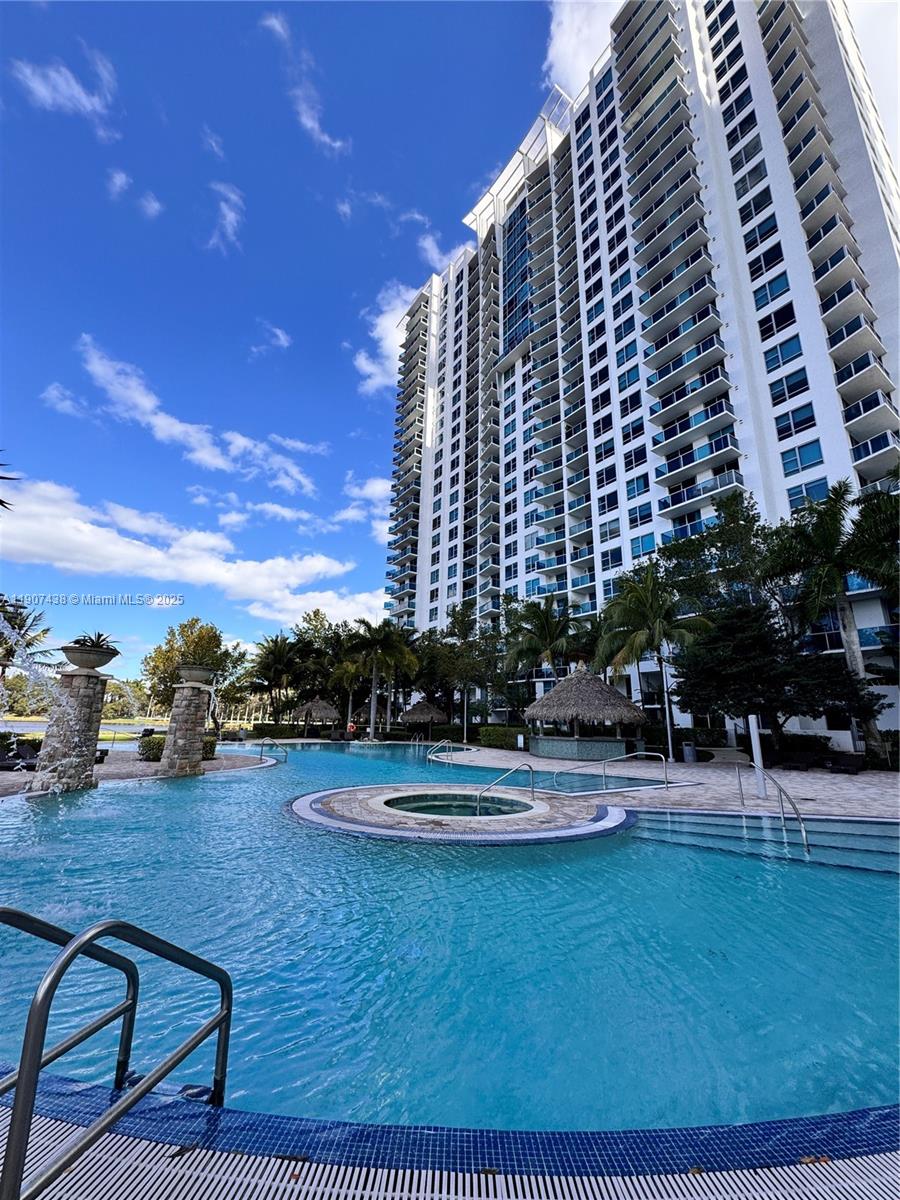 2641 North Flamingo Road, Unit 2208N Sunrise, FL 33323 - Photo 43 of 56 a view of building with outdoor space