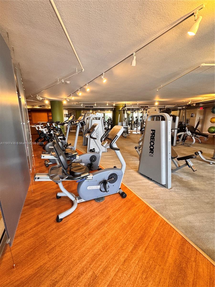 2641 North Flamingo Road, Unit 2208N Sunrise, FL 33323 - Photo 50 of 56 a view of a room with gym equipment