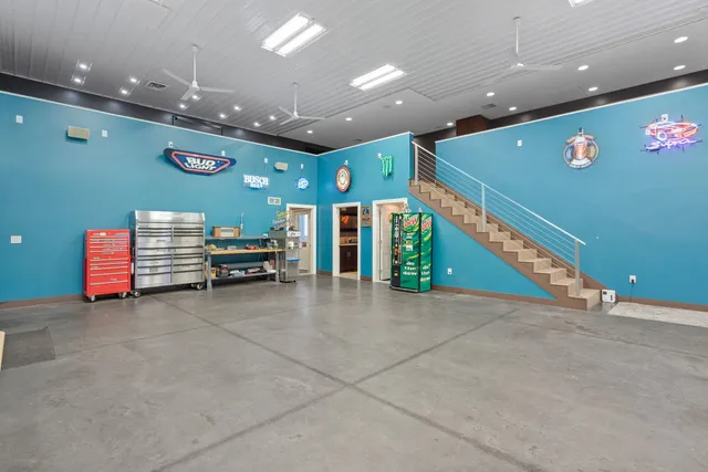 a view of a hallway with stairs