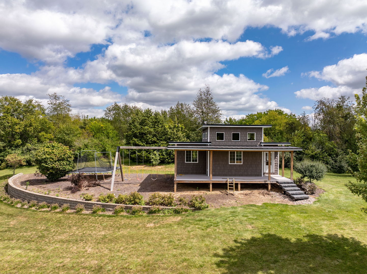9901 Highway 6 Geneseo, IL 61254 - Photo 24 of 29 a view of a house with swimming pool and sitting area