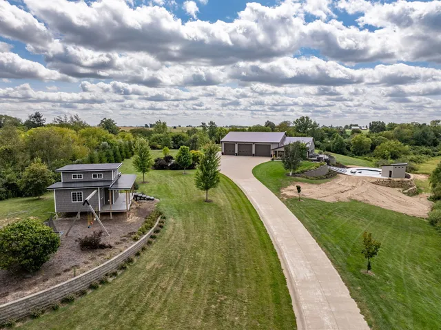 a view of a garden with houses