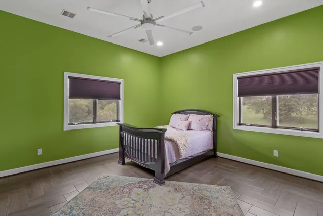 a room with a bed and a window