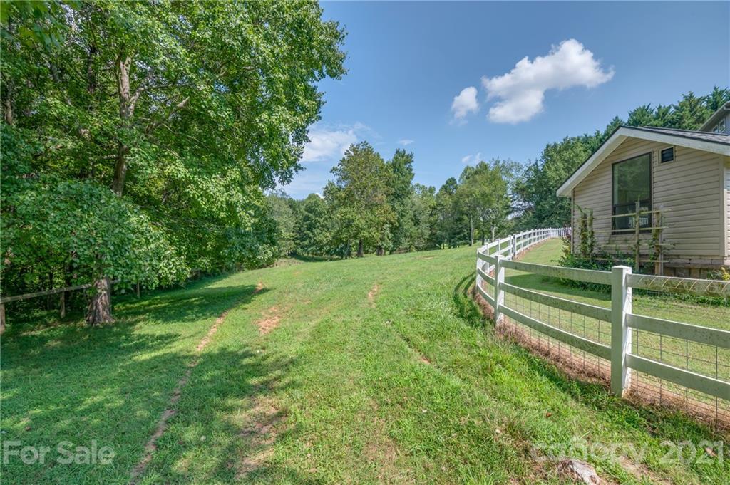 2101 Peniel Road Columbus, NC 28722 - Photo 2 of 48 a view of backyard with green space