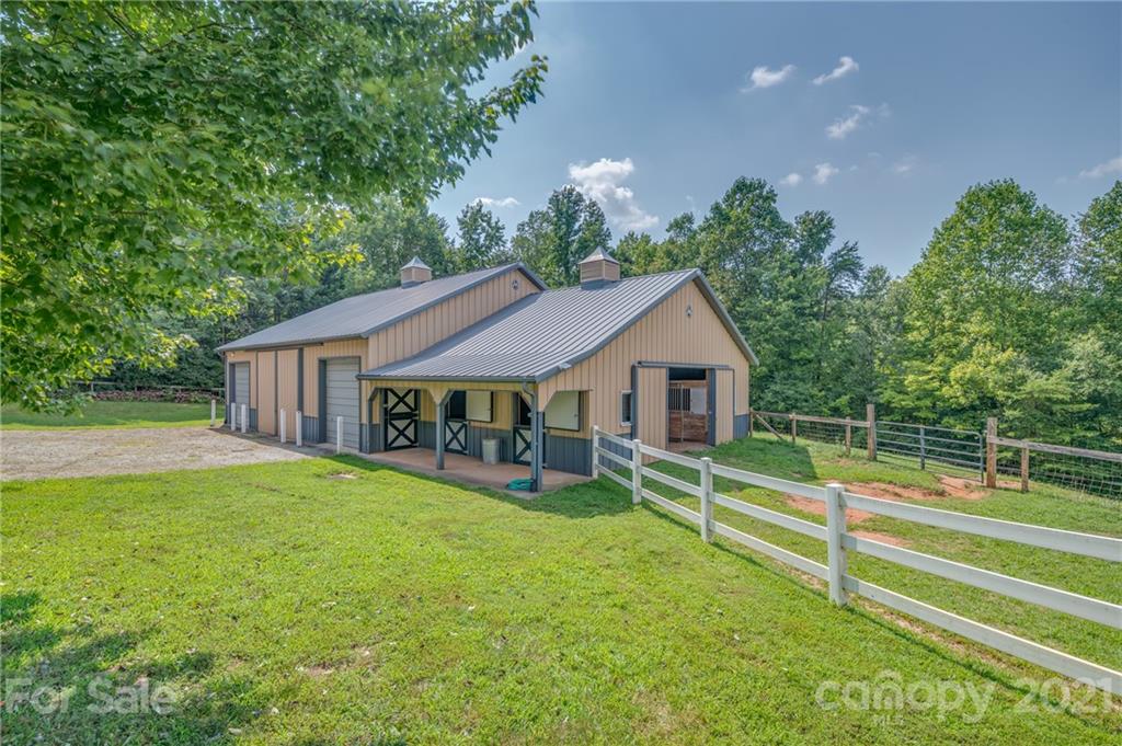 2101 Peniel Road Columbus, NC 28722 - Photo 11 of 48 a house view with a garden space
