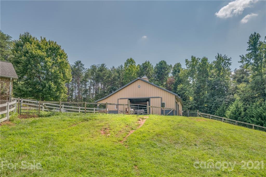 2101 Peniel Road Columbus, NC 28722 - Photo 3 of 48 a house with swimming pool in front of it