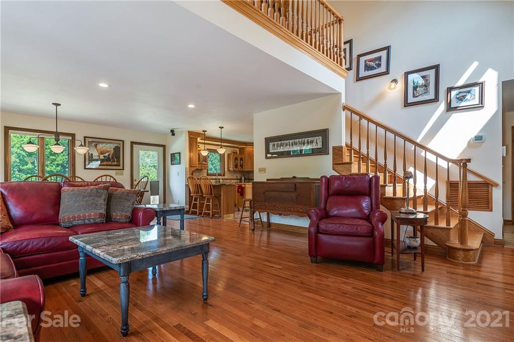 2101 Peniel Road Columbus, NC 28722 - Photo 23 of 48 a living room with furniture and a wooden floor
