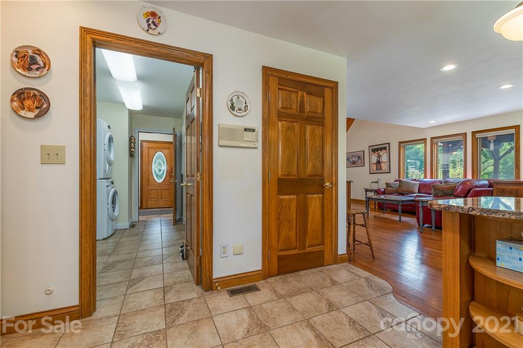 2101 Peniel Road Columbus, NC 28722 - Photo 29 of 48 a view of a livingroom with furniture and hardwood floor
