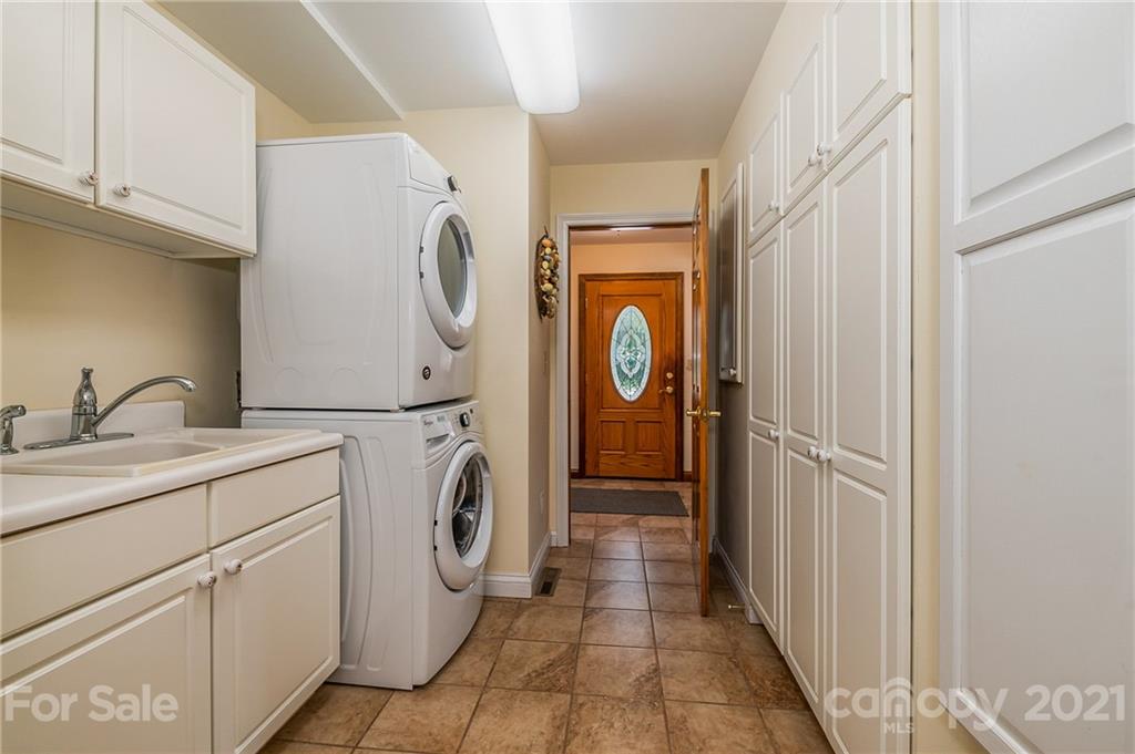2101 Peniel Road Columbus, NC 28722 - Photo 30 of 48 a utility room with dryer and washer