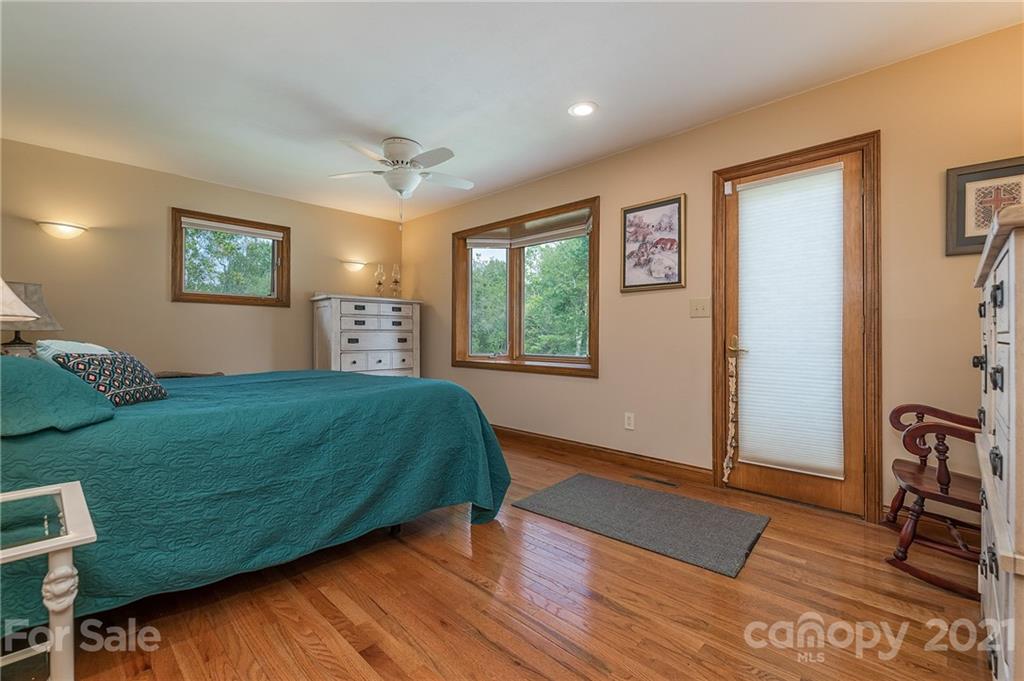 2101 Peniel Road Columbus, NC 28722 - Photo 34 of 48 a living room with a bed furniture and a window