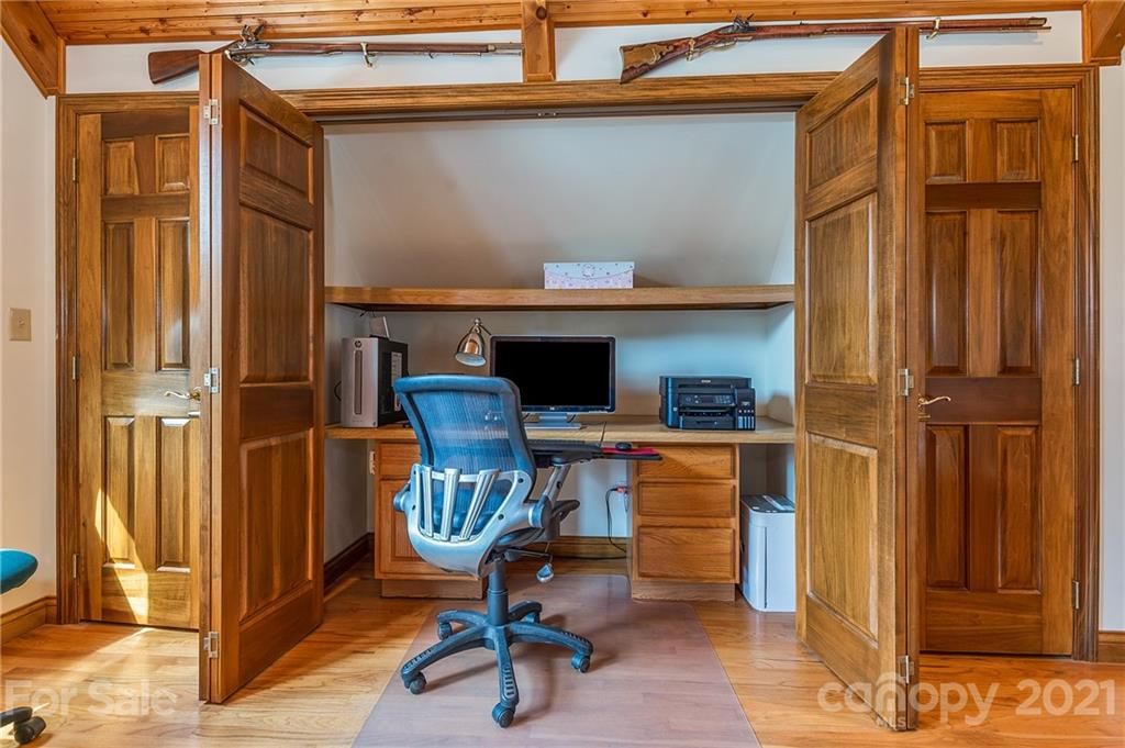 2101 Peniel Road Columbus, NC 28722 - Photo 43 of 48 a view of workspace with wooden floor windows