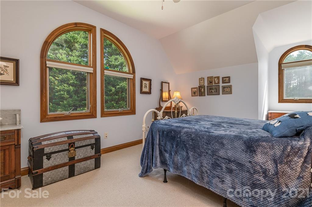 2101 Peniel Road Columbus, NC 28722 - Photo 47 of 48 a bed room with a bed and a window