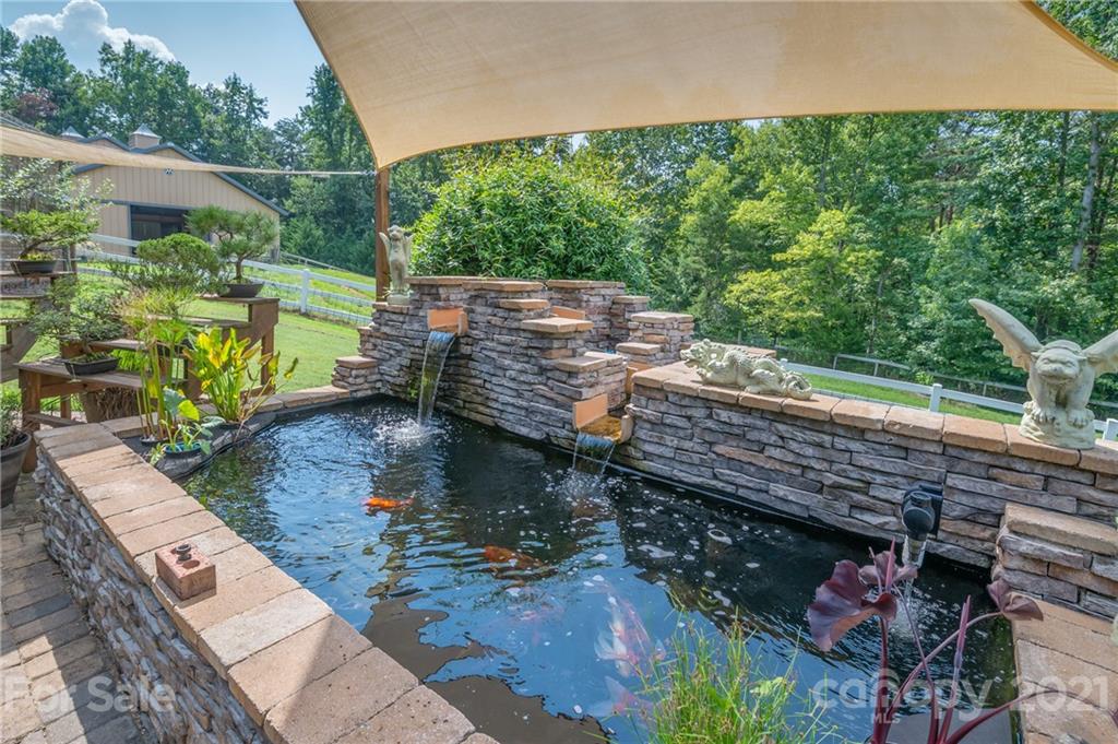 2101 Peniel Road Columbus, NC 28722 - Photo 7 of 48 a view of a backyard with sitting area