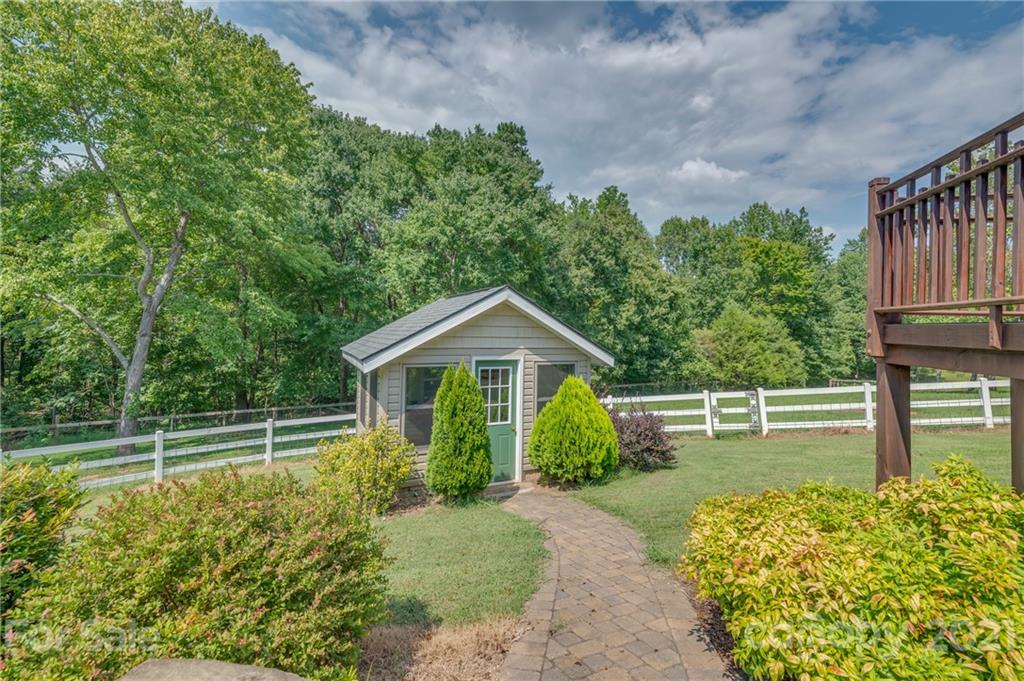 2101 Peniel Road Columbus, NC 28722 - Photo 8 of 48 a front view of a house with a garden