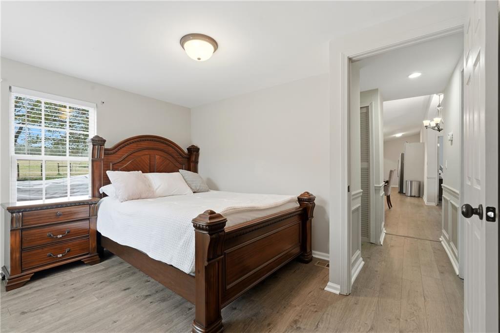 1295 Double Bridges Road Winder, GA 30680 - Photo 24 of 57 a bedroom with a bed and a window