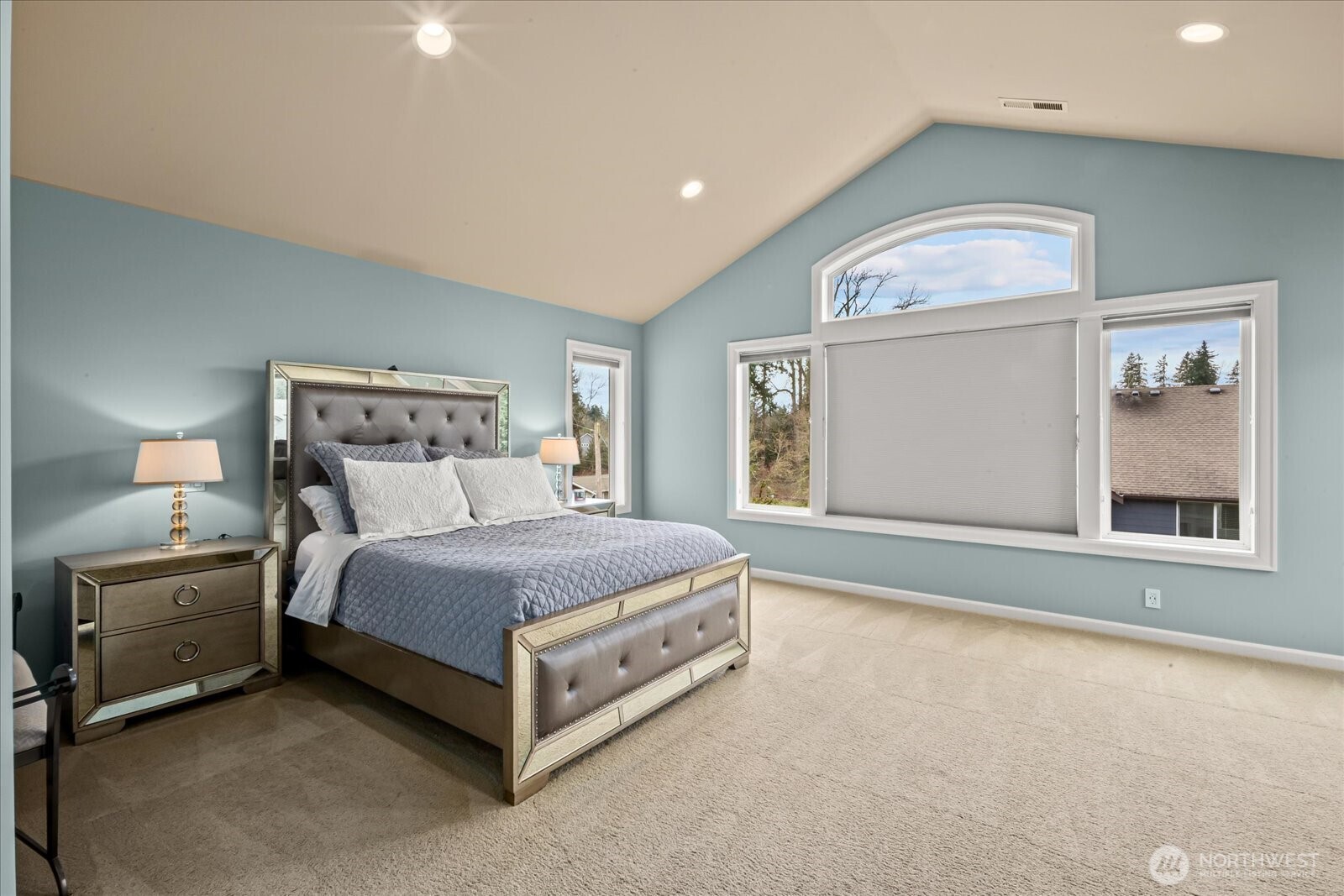 215 Ilwaco Place Southeast Renton, WA 98059 - Photo 18 of 40 a bed room with a bed and a large window