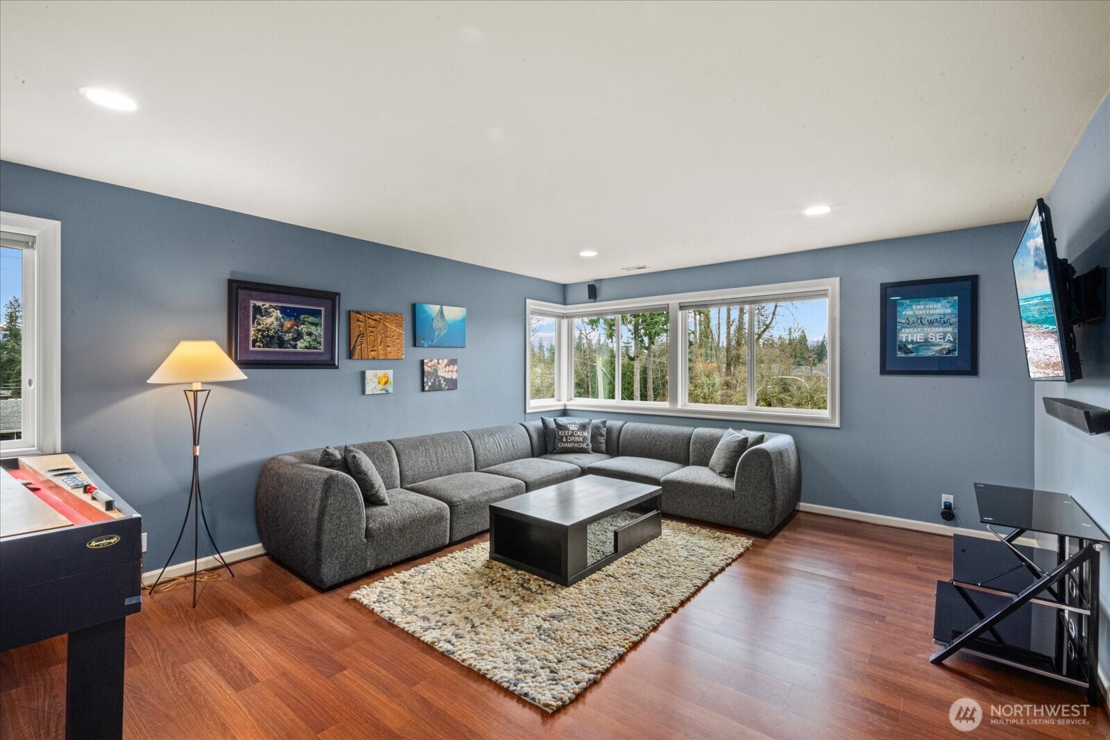 215 Ilwaco Place Southeast Renton, WA 98059 - Photo 21 of 40 a living room with furniture and a window
