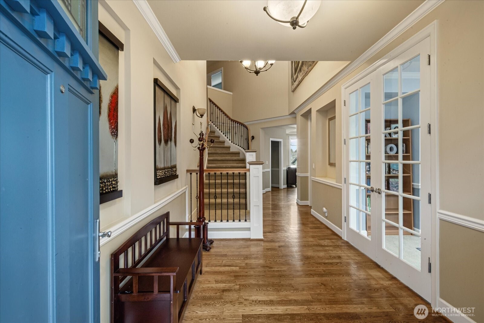 215 Ilwaco Place Southeast Renton, WA 98059 - Photo 4 of 40 a view of entryway with wooden floor