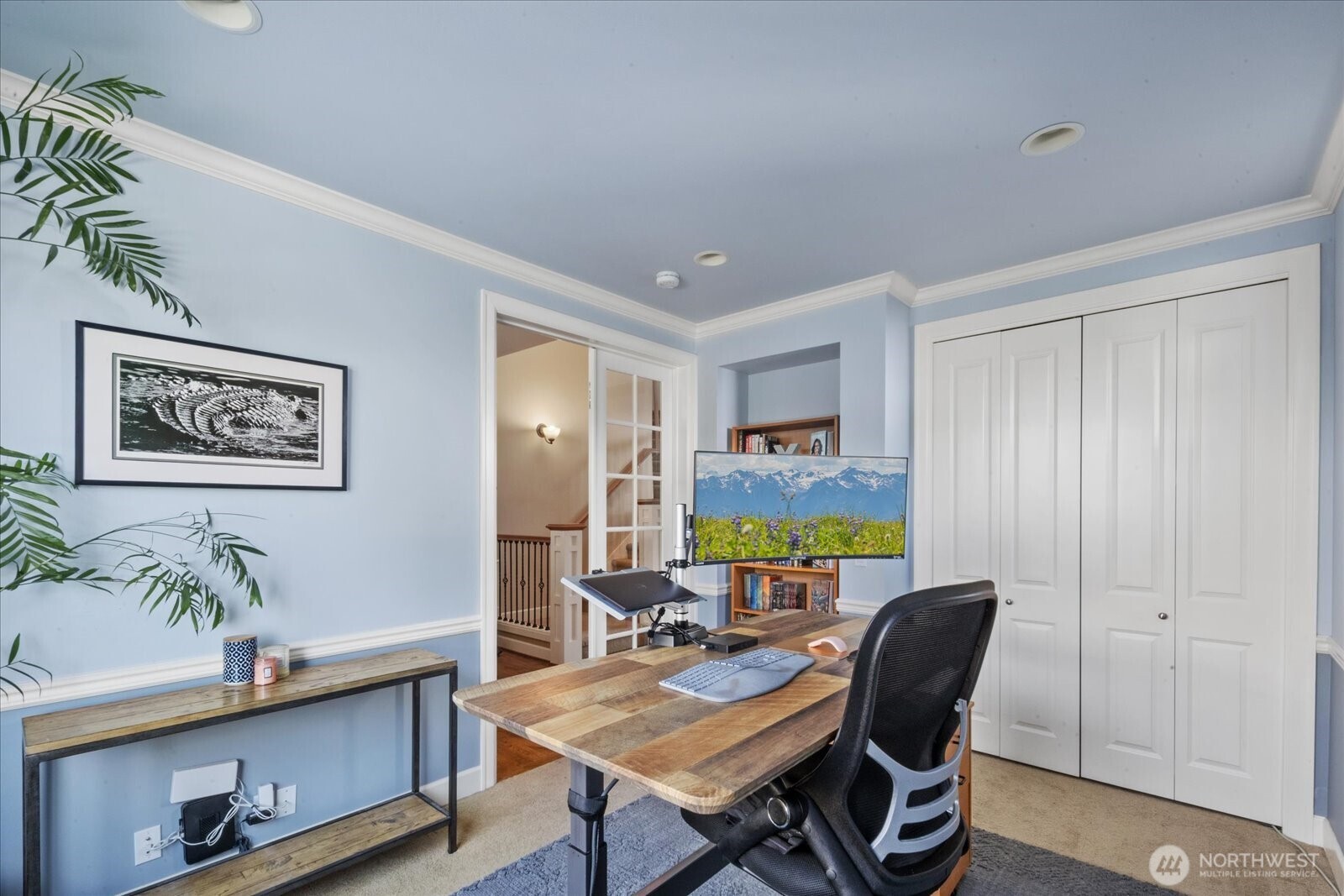 215 Ilwaco Place Southeast Renton, WA 98059 - Photo 7 of 40 a view of a workspace with furniture and a workspace
