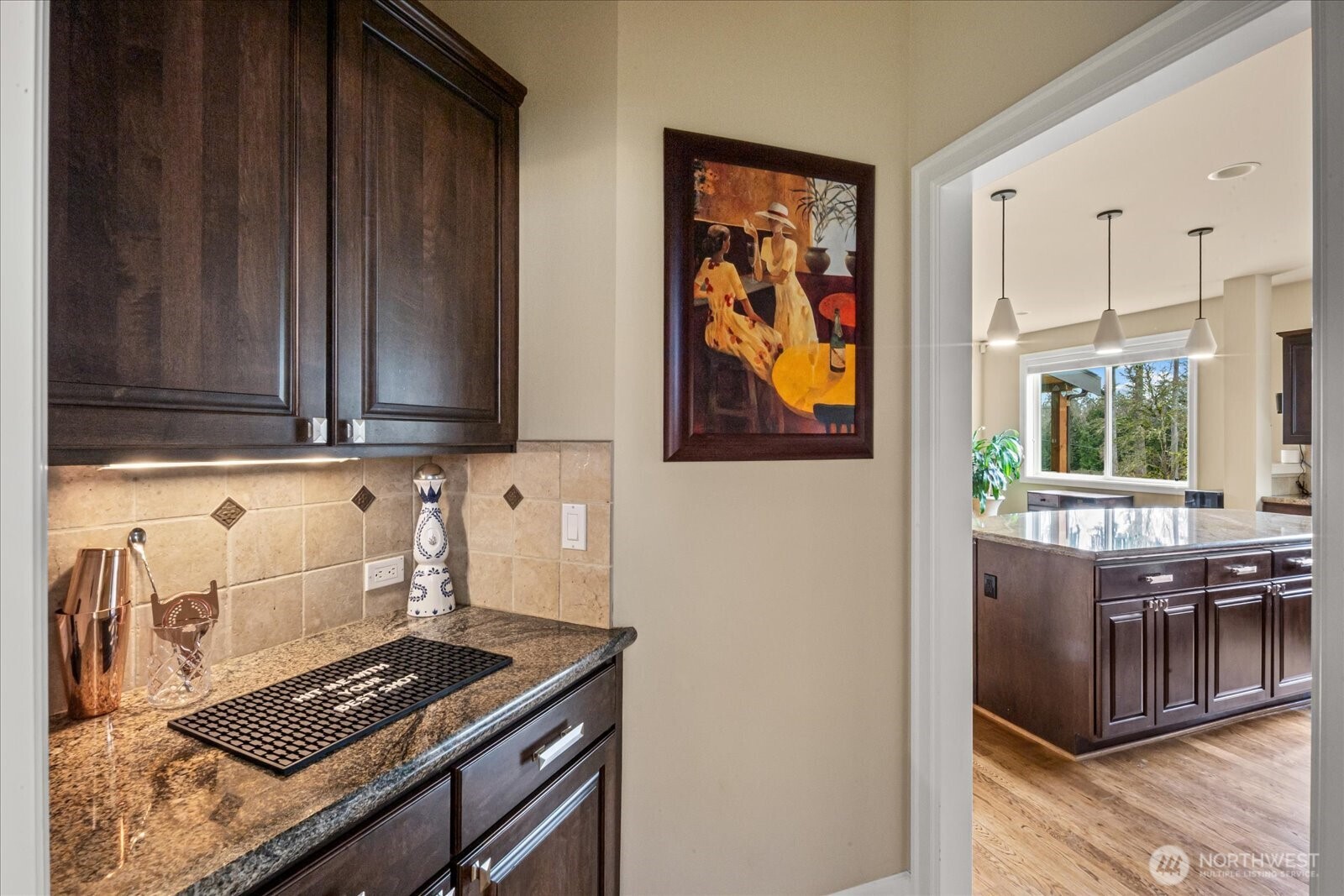 215 Ilwaco Place Southeast Renton, WA 98059 - Photo 9 of 40 a kitchen with stainless steel appliances a stove and a microwave