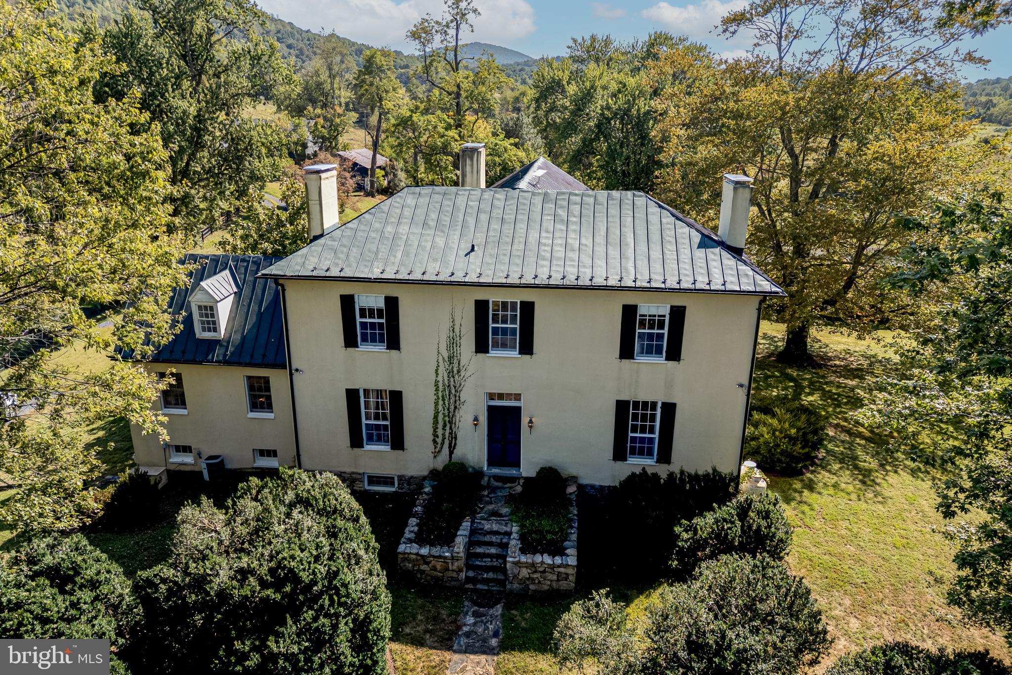 front view of a house with a garden