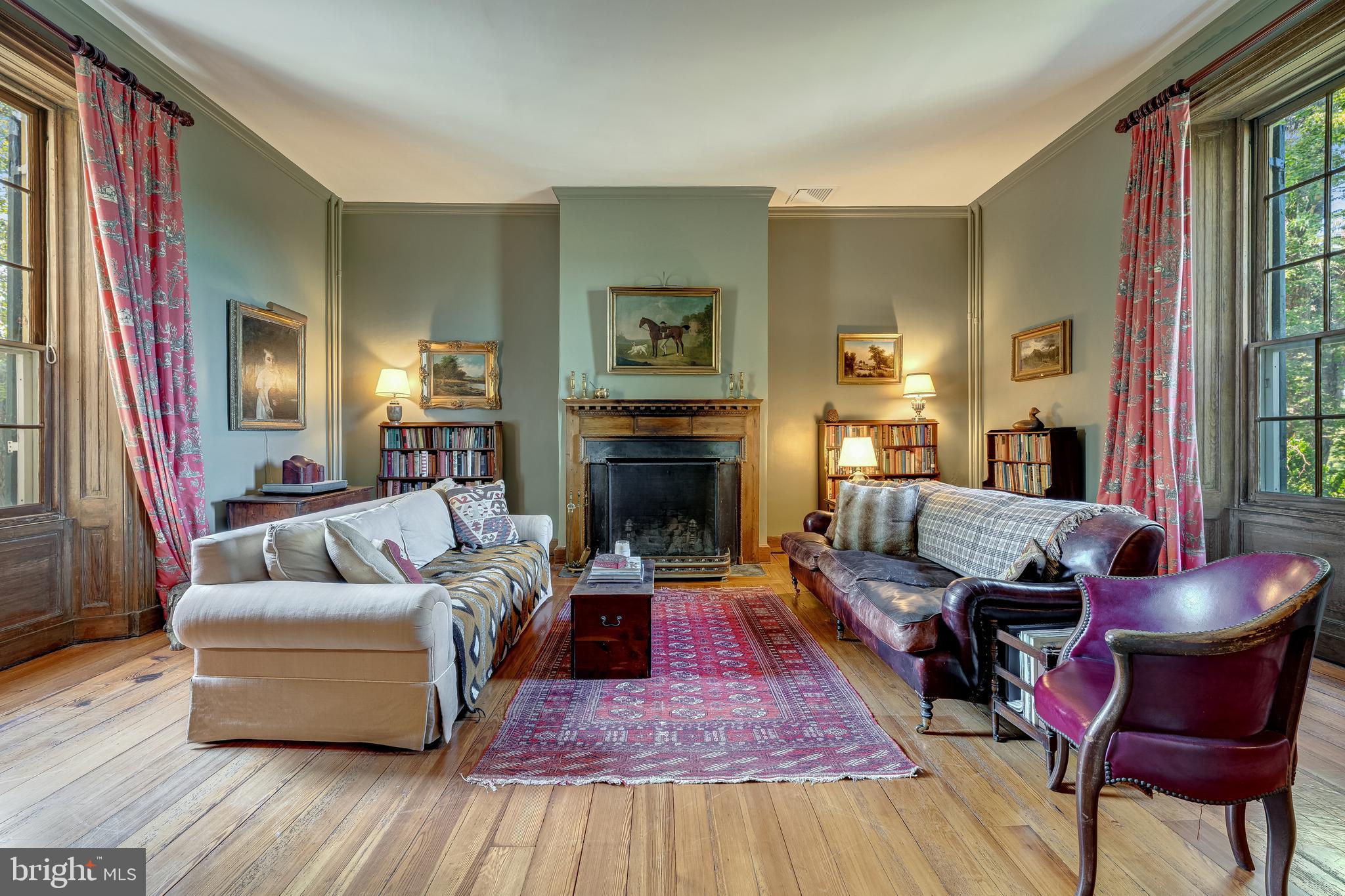 3707 Carrington Road Delaplane, VA 20144 - Photo 15 of 52 a living room with furniture and a fireplace