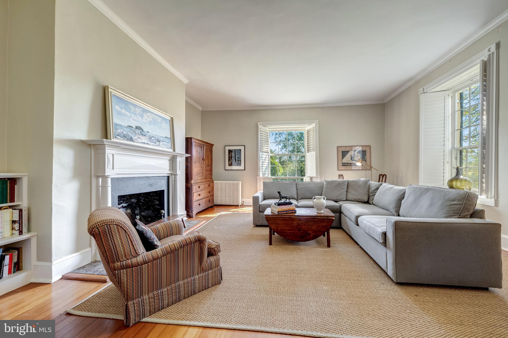 3707 Carrington Road Delaplane, VA 20144 - Photo 20 of 52 a living room with furniture and a fireplace