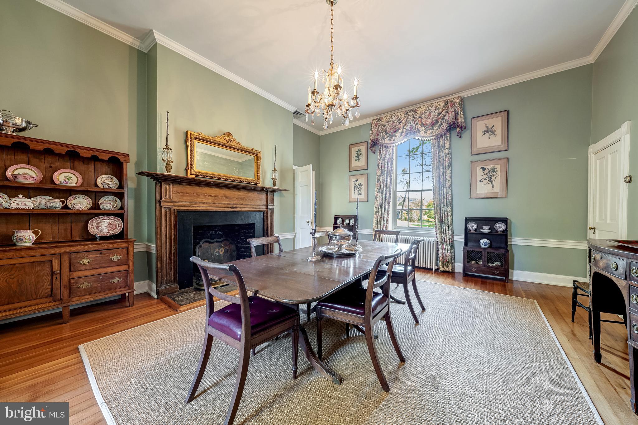 3707 Carrington Road Delaplane, VA 20144 - Photo 23 of 52 a view of a dining room with furniture window and wooden floor