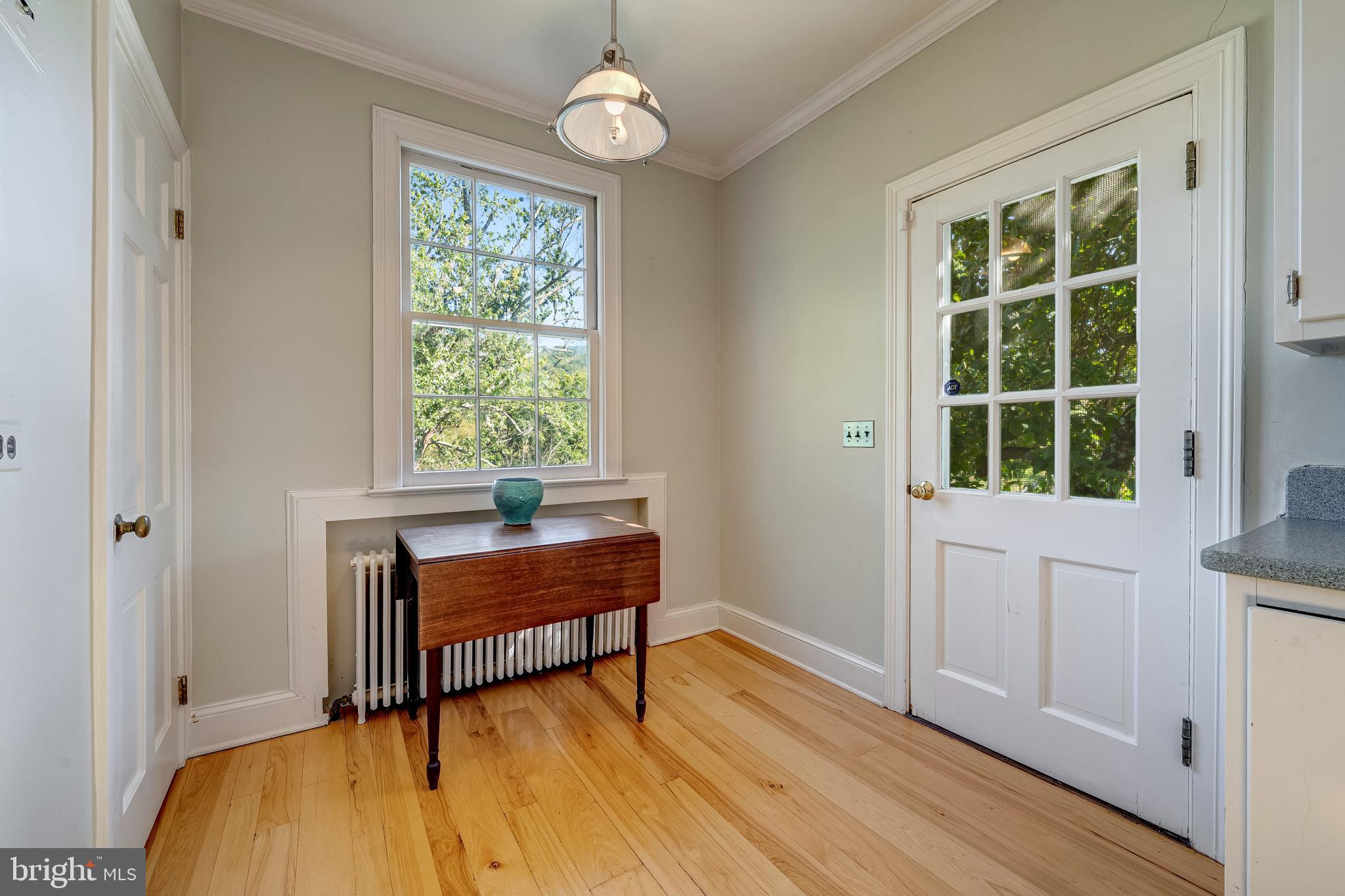 3707 Carrington Road Delaplane, VA 20144 - Photo 28 of 52 a room with wooden floor and windows