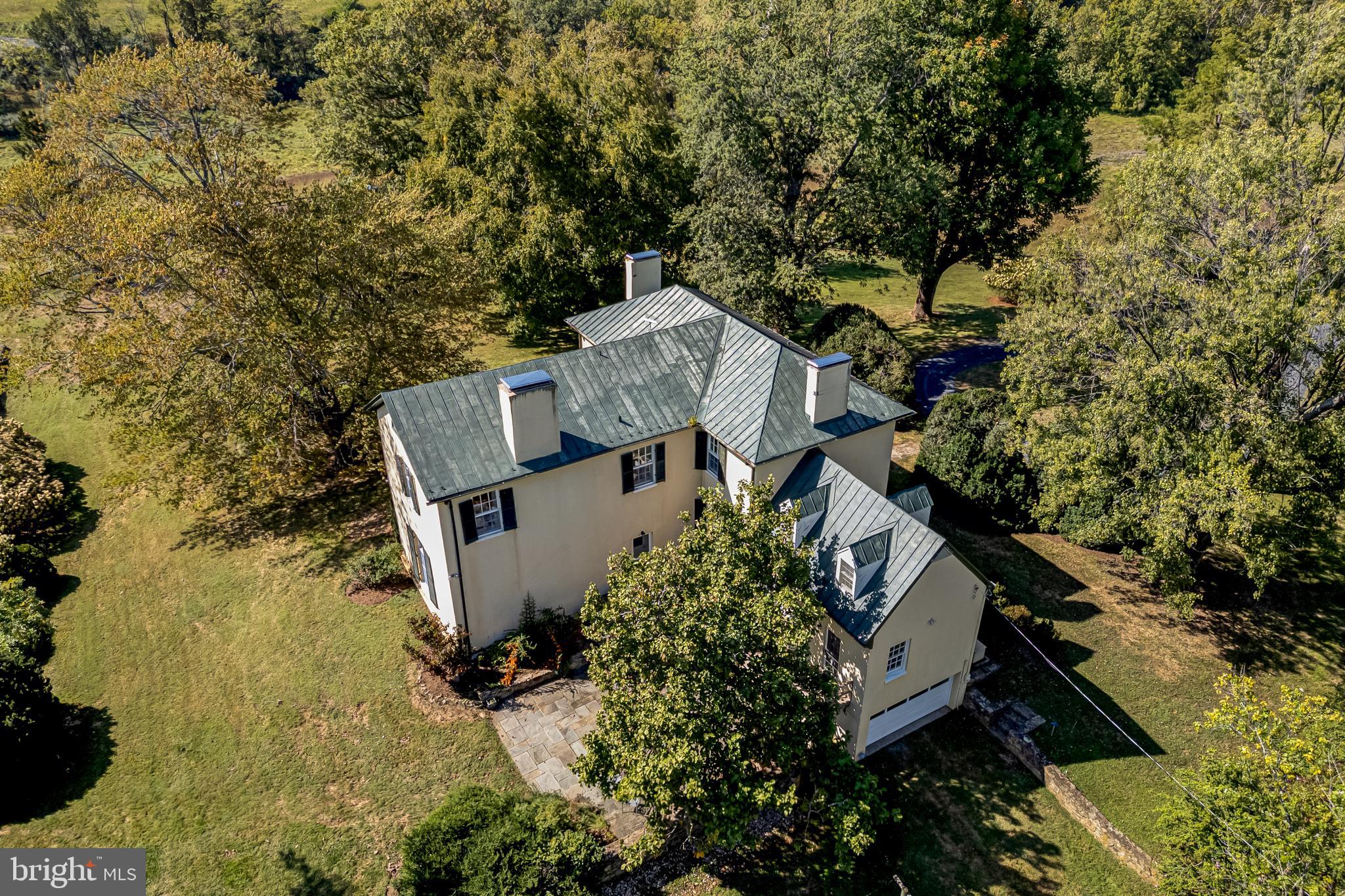 3707 Carrington Road Delaplane, VA 20144 - Photo 3 of 52 an aerial view of a house with trees all around