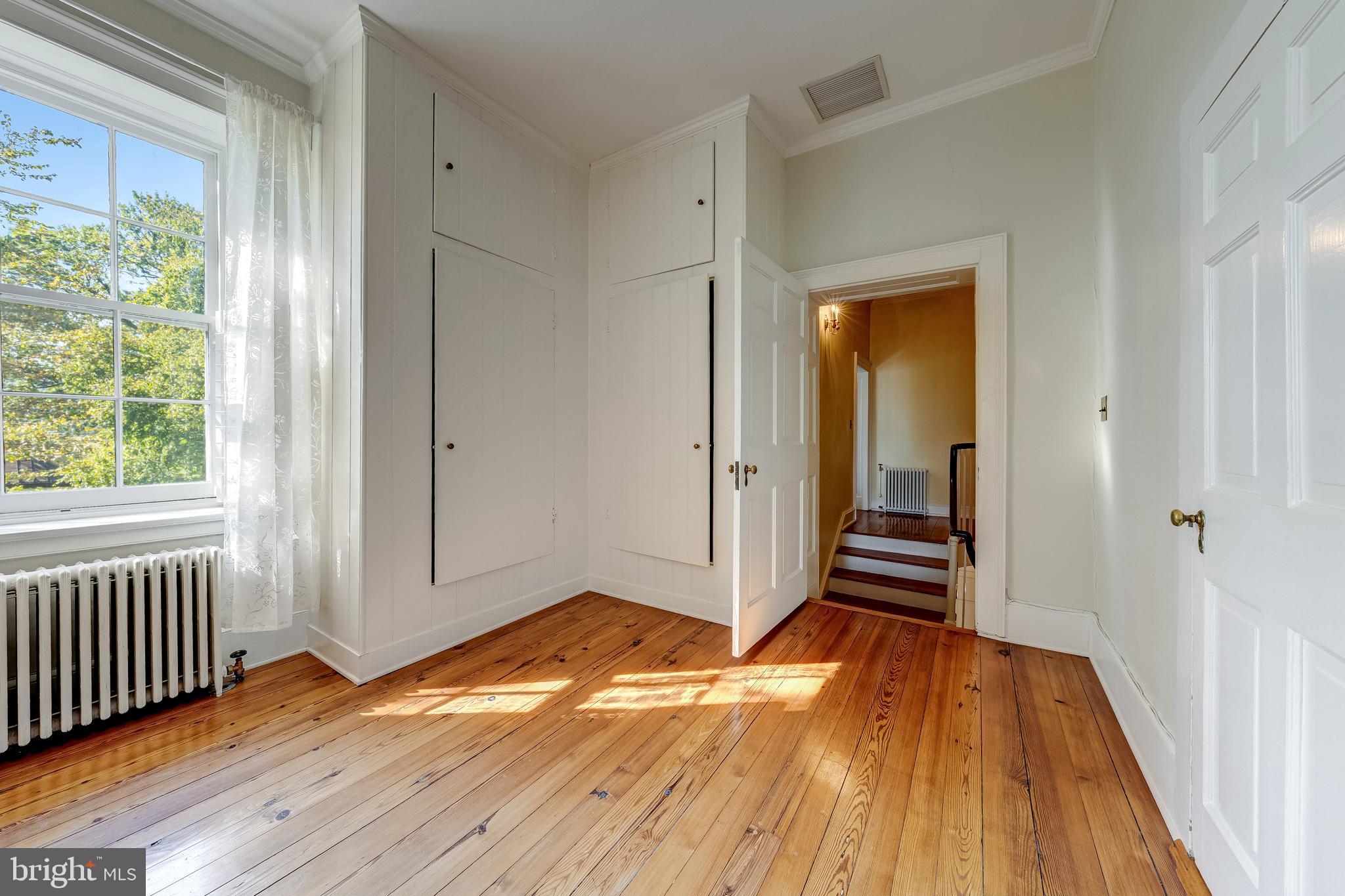 3707 Carrington Road Delaplane, VA 20144 - Photo 31 of 52 a view of a room with wooden floor and a window