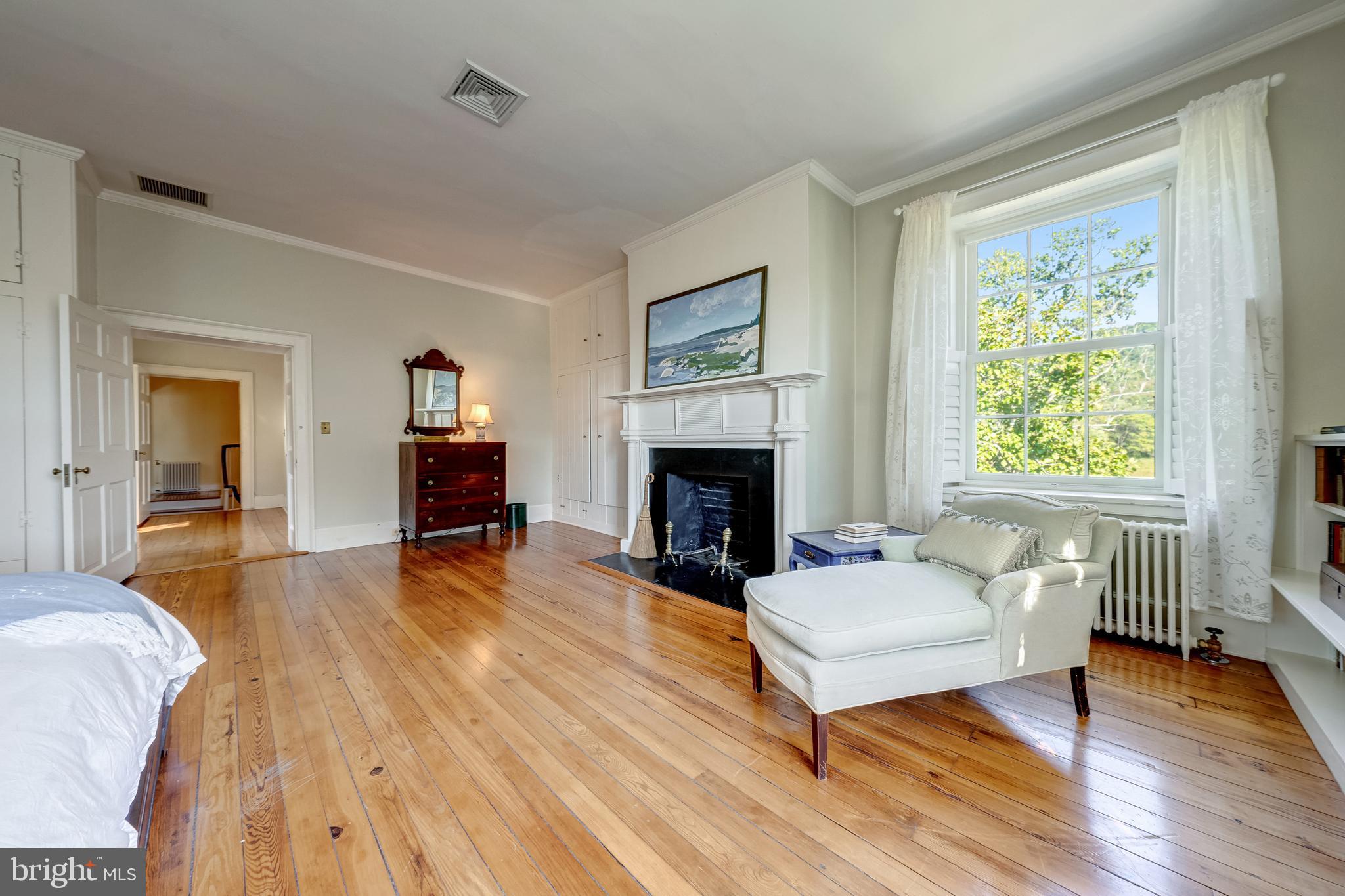3707 Carrington Road Delaplane, VA 20144 - Photo 33 of 52 a living room with furniture and a fireplace