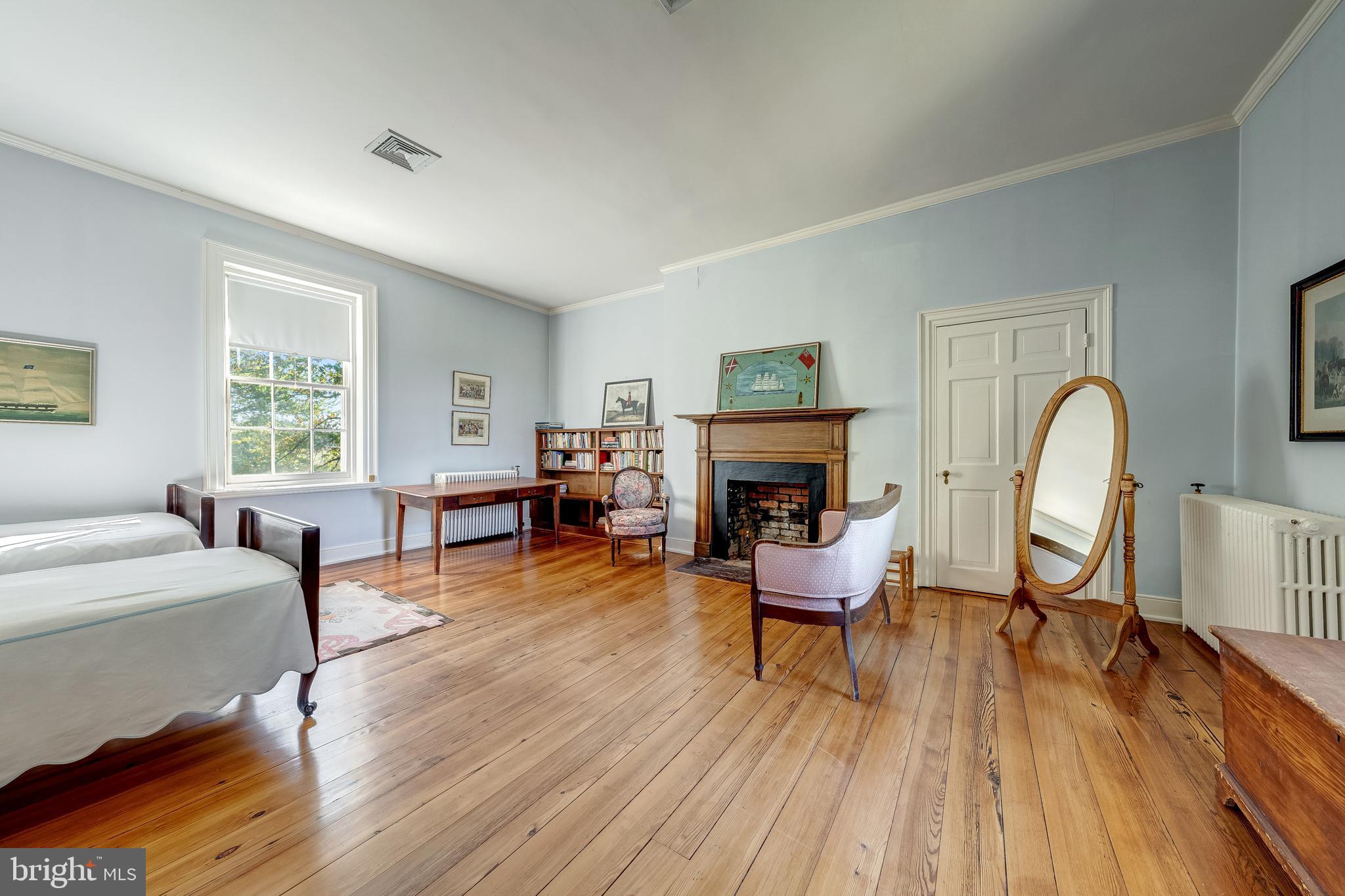 3707 Carrington Road Delaplane, VA 20144 - Photo 35 of 52 a living room with furniture a fireplace and a table