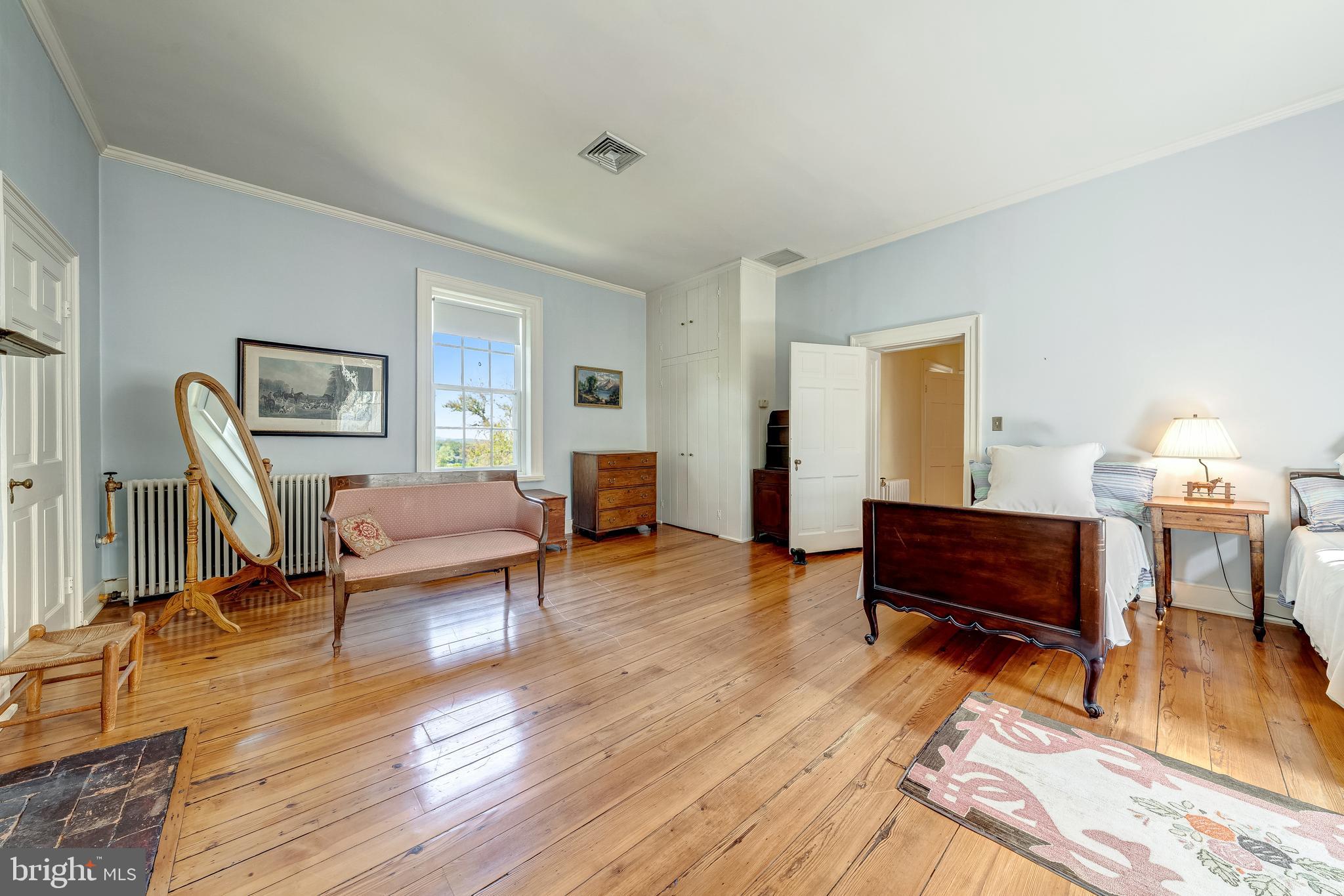 3707 Carrington Road Delaplane, VA 20144 - Photo 36 of 52 a living room with furniture and a wooden floor