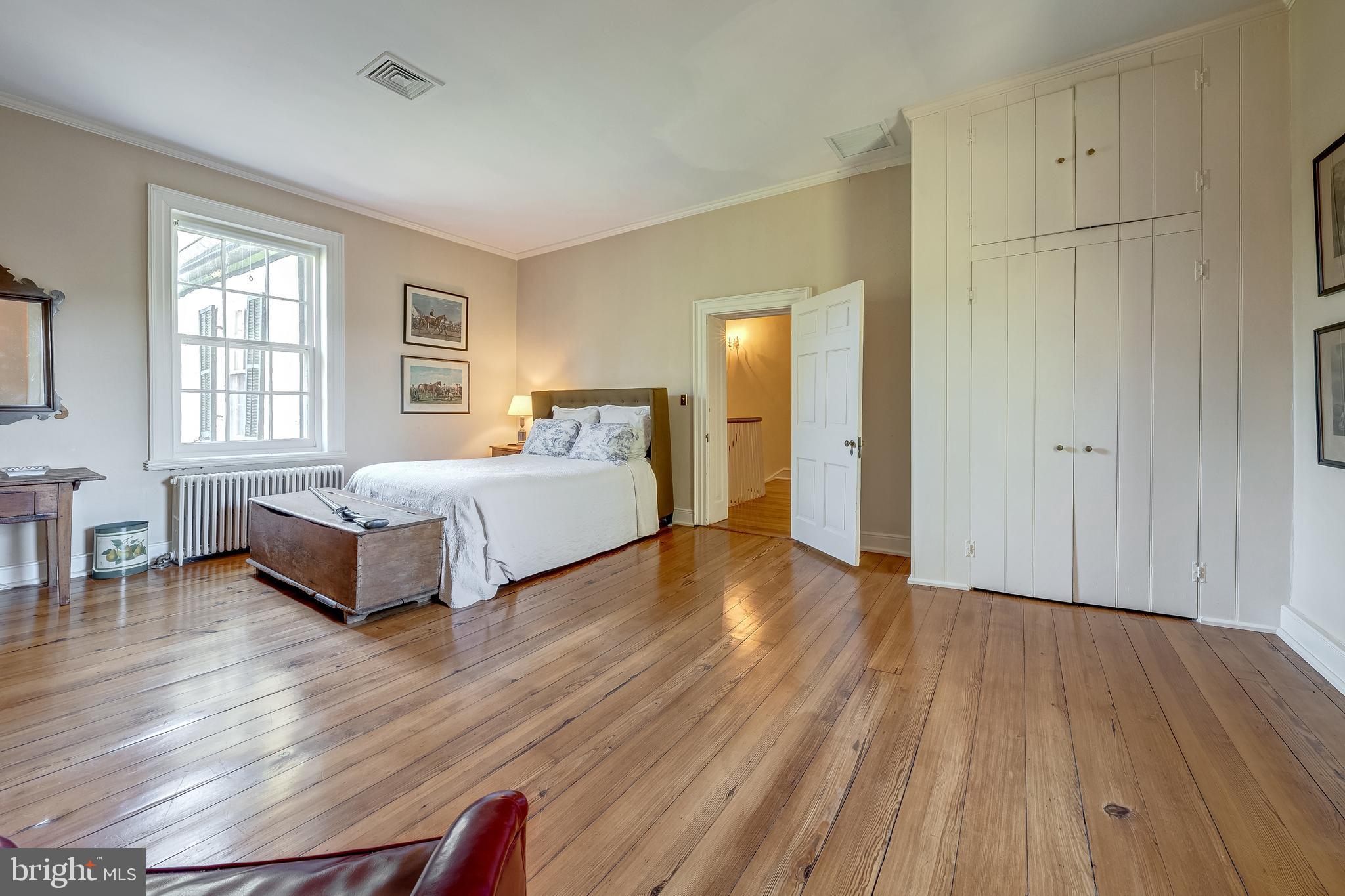 3707 Carrington Road Delaplane, VA 20144 - Photo 38 of 52 a spacious bedroom with a bed and a dresser