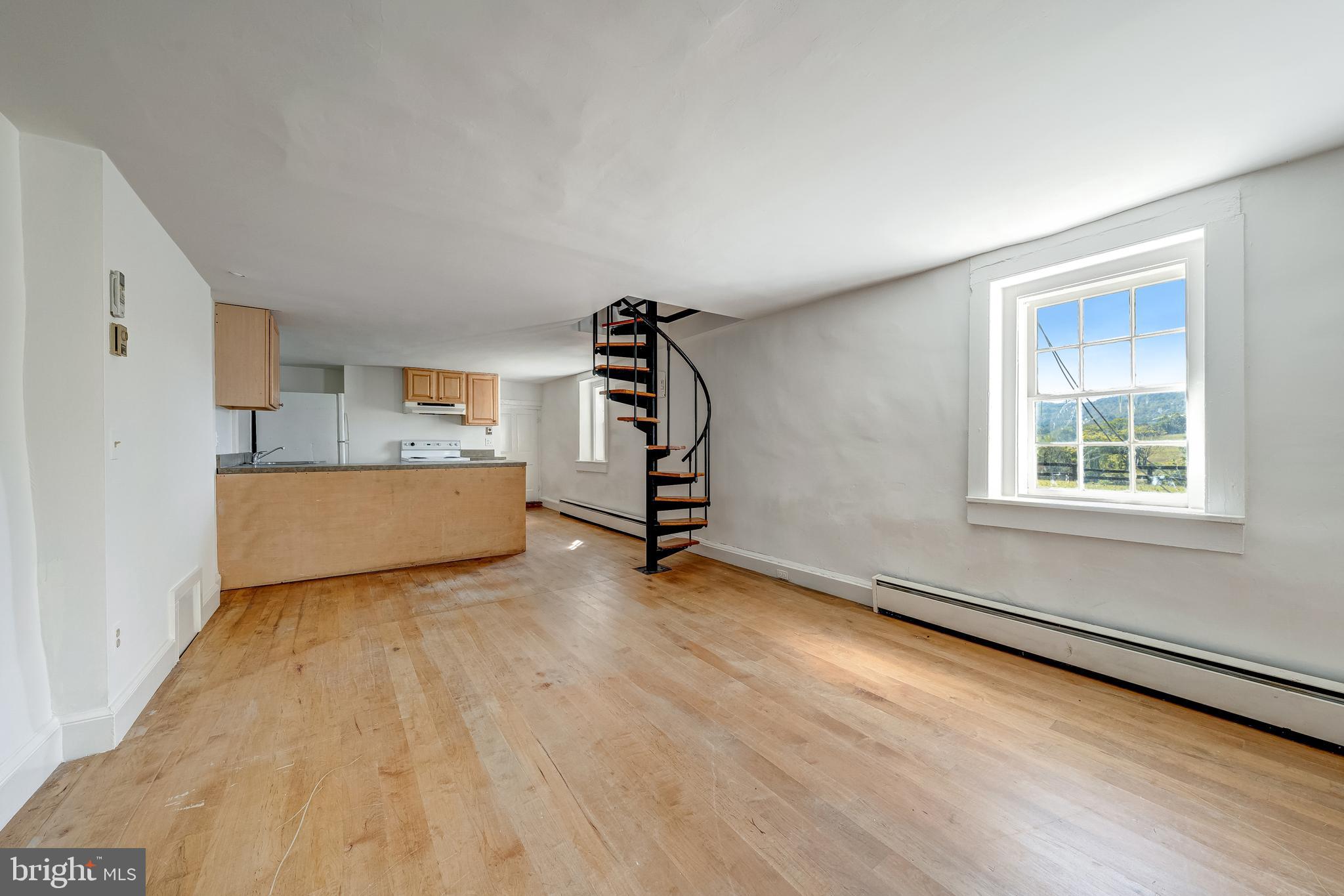 3707 Carrington Road Delaplane, VA 20144 - Photo 41 of 52 a view of an empty room with a window