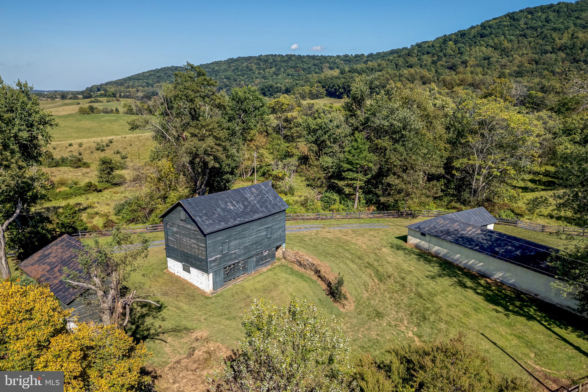 3707 Carrington Road Delaplane, VA 20144 - Photo 47 of 52 a view of a two chairs and a table in the pool