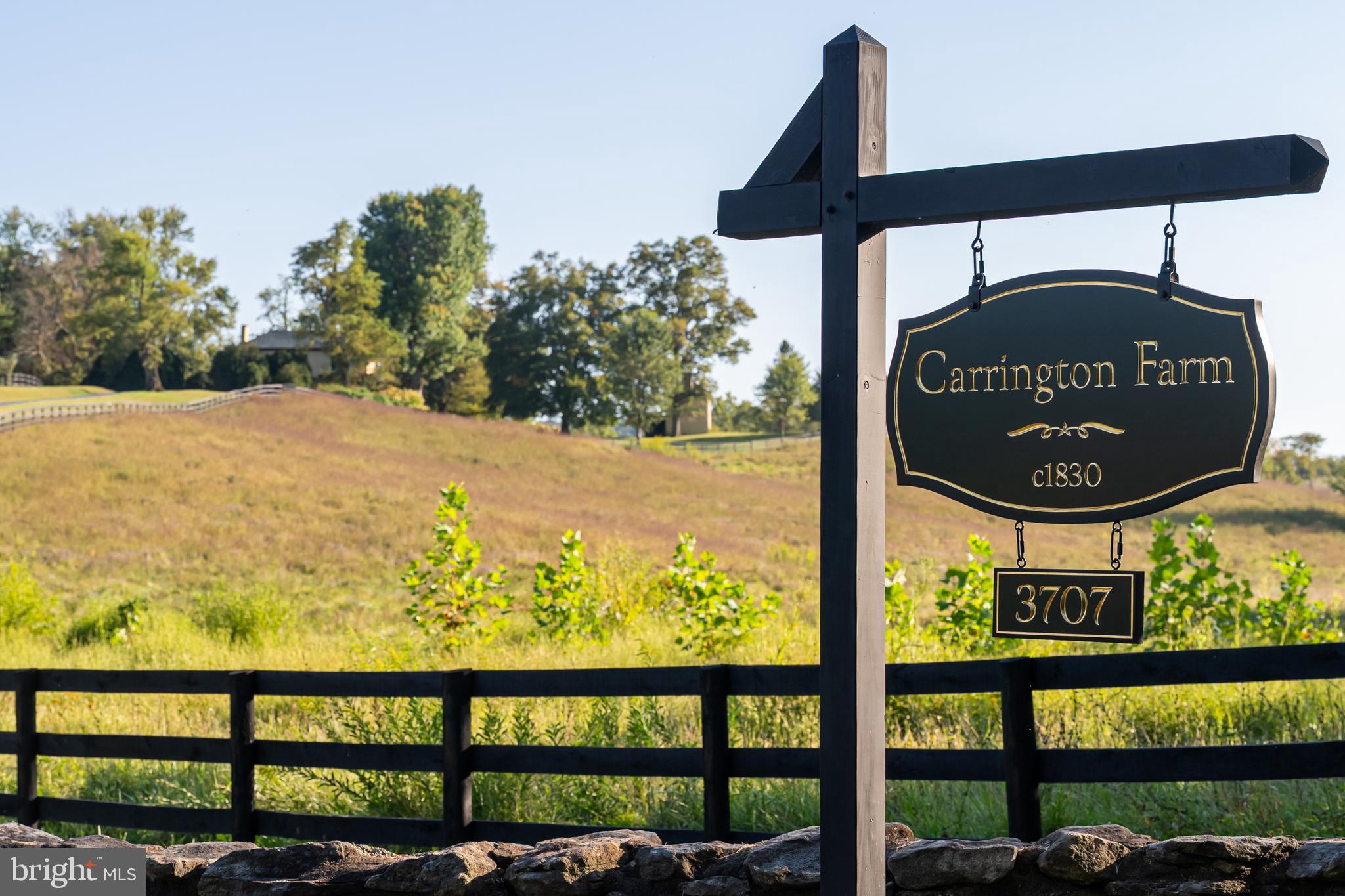 3707 Carrington Road Delaplane, VA 20144 - Photo 5 of 52 a sign on the side of a building
