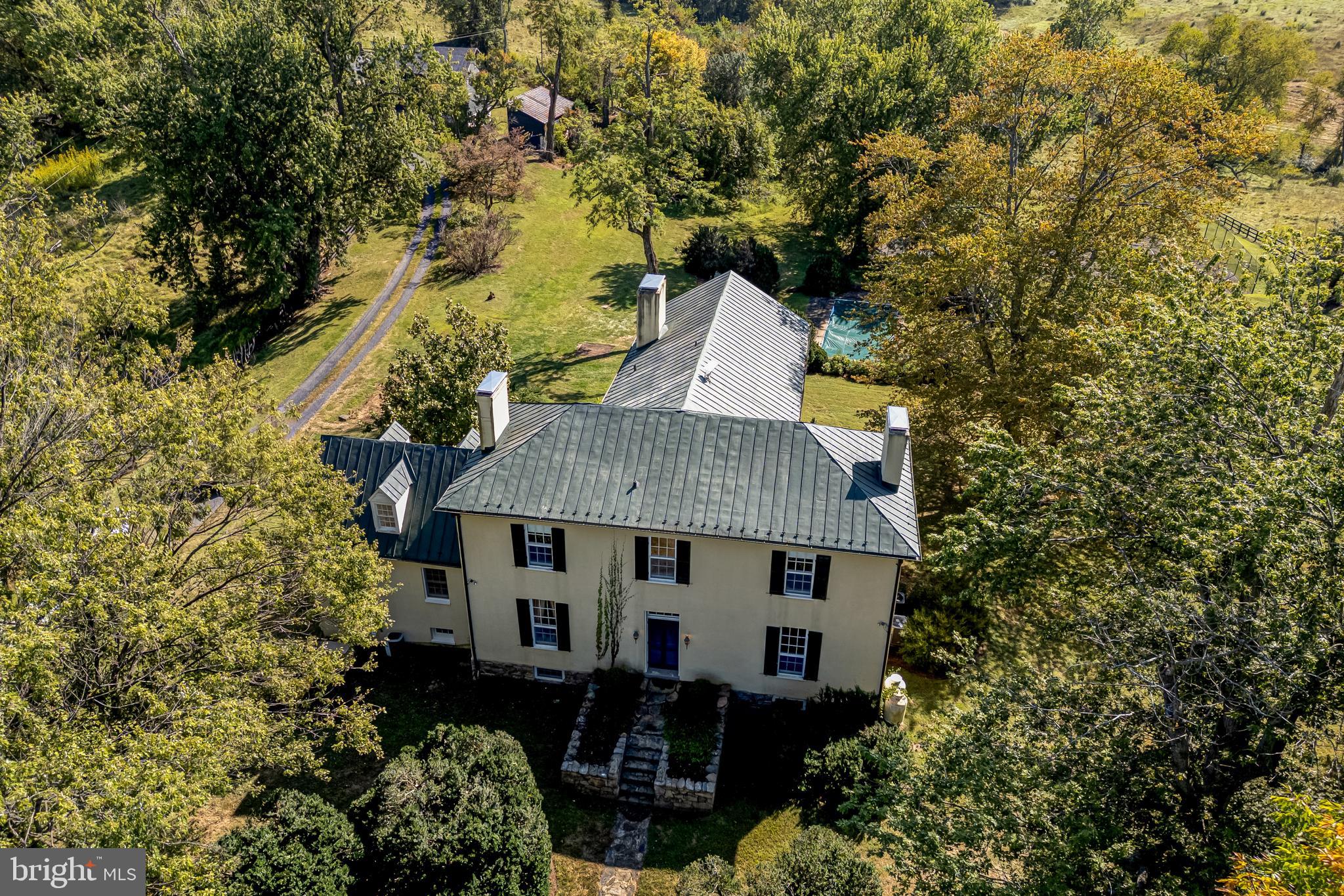 3707 Carrington Road Delaplane, VA 20144 - Photo 7 of 52 a house view with a garden space