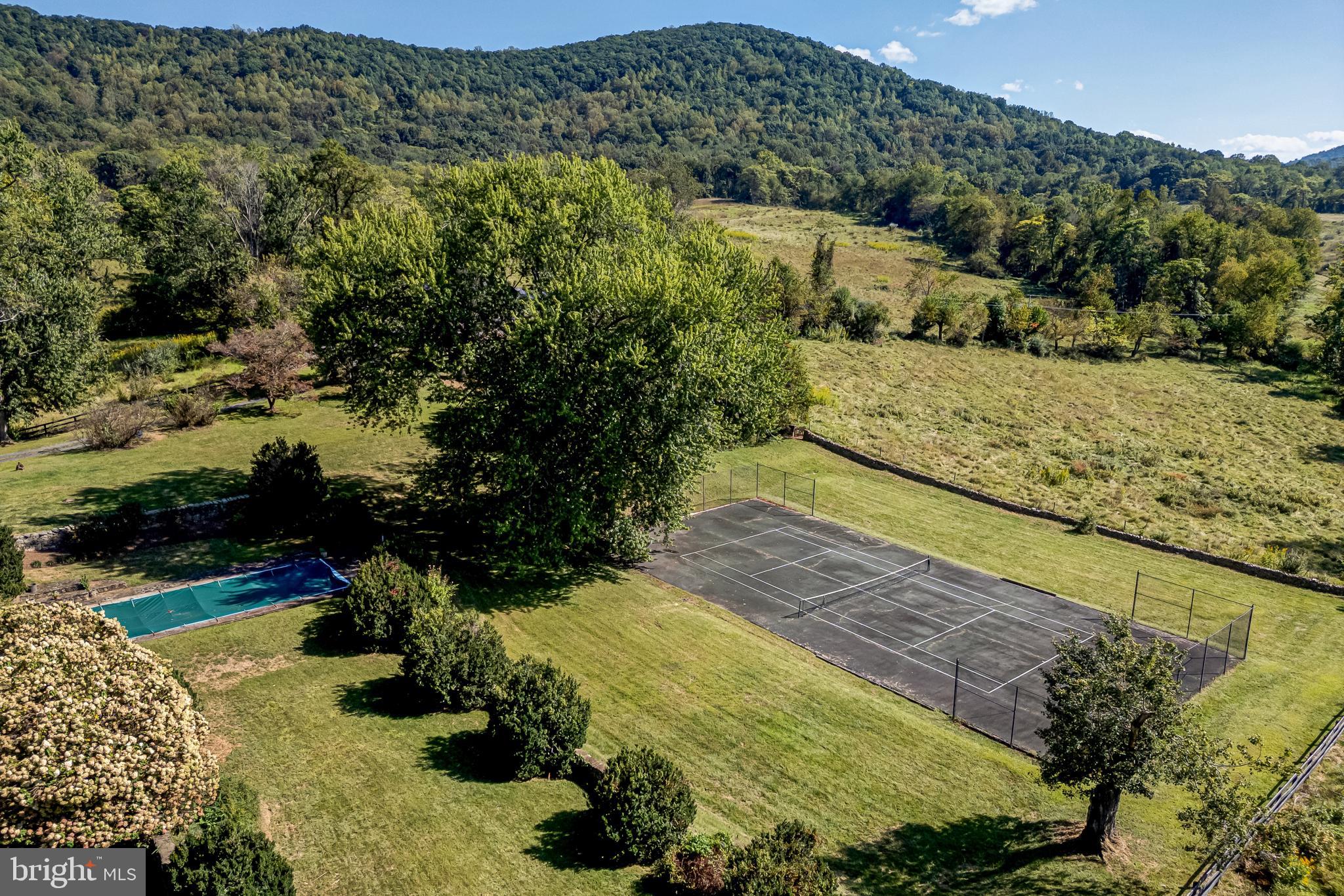 3707 Carrington Road Delaplane, VA 20144 - Photo 10 of 52 a view of a yard with an outdoor space
