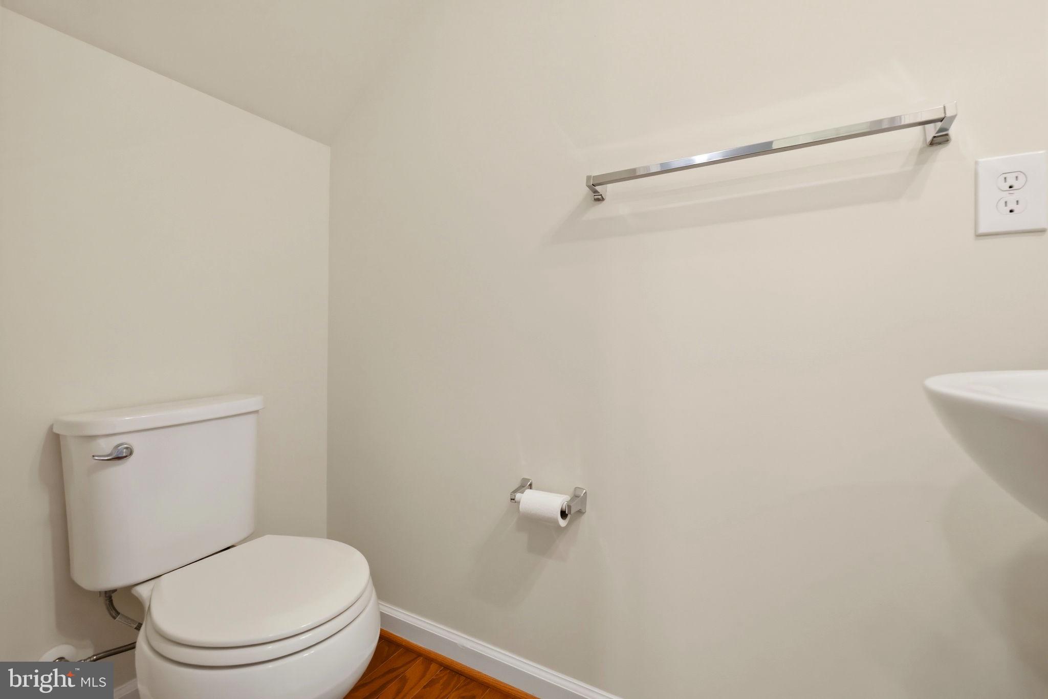 43487 Town Gate Square Chantilly, VA 20152 - Photo 19 of 56 a white toilet sitting next to a shower