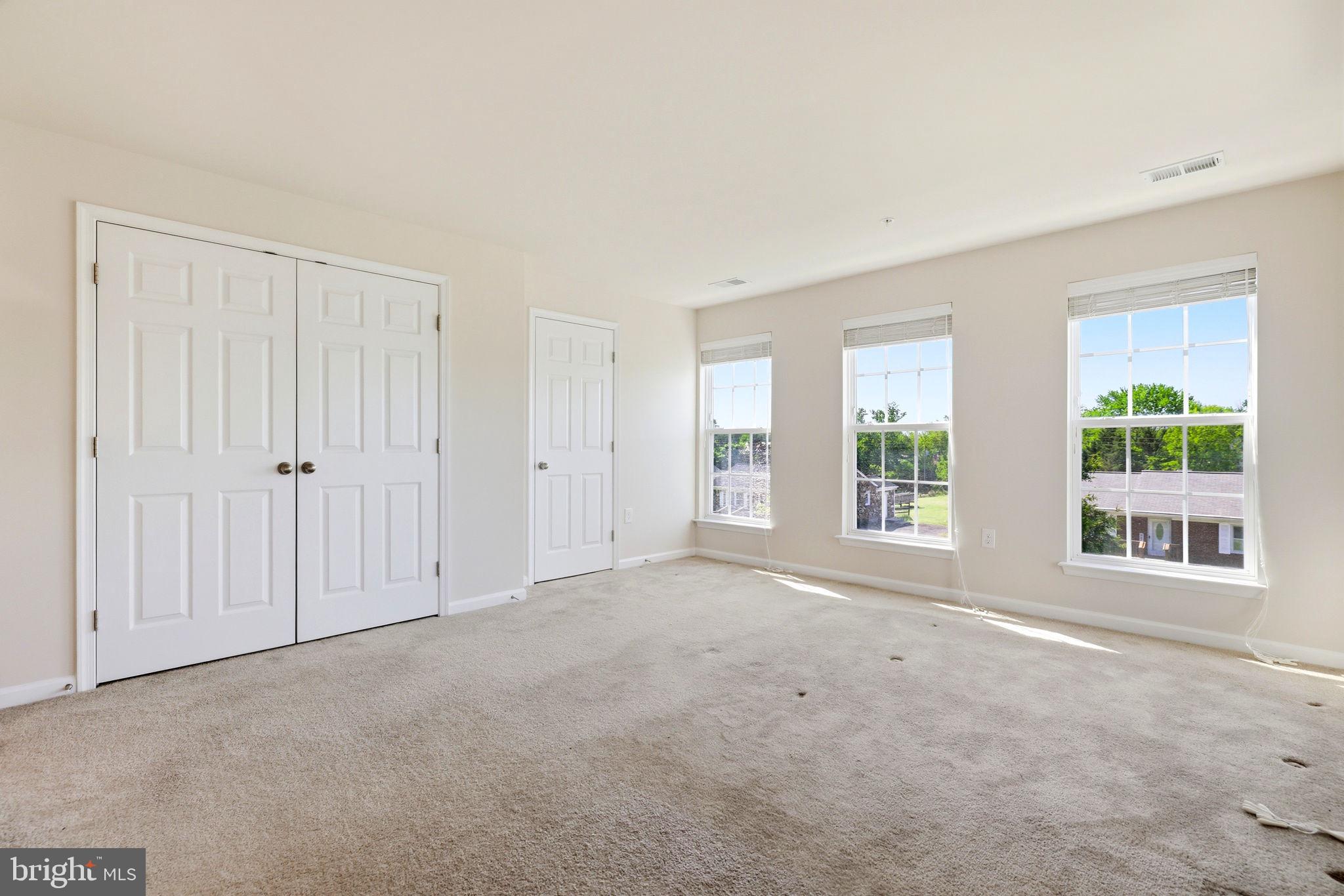 43487 Town Gate Square Chantilly, VA 20152 - Photo 26 of 56 an empty room with windows
