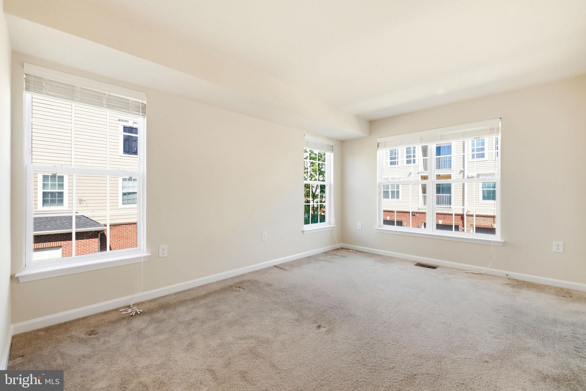 43487 Town Gate Square Chantilly, VA 20152 - Photo 35 of 56 an empty room with windows