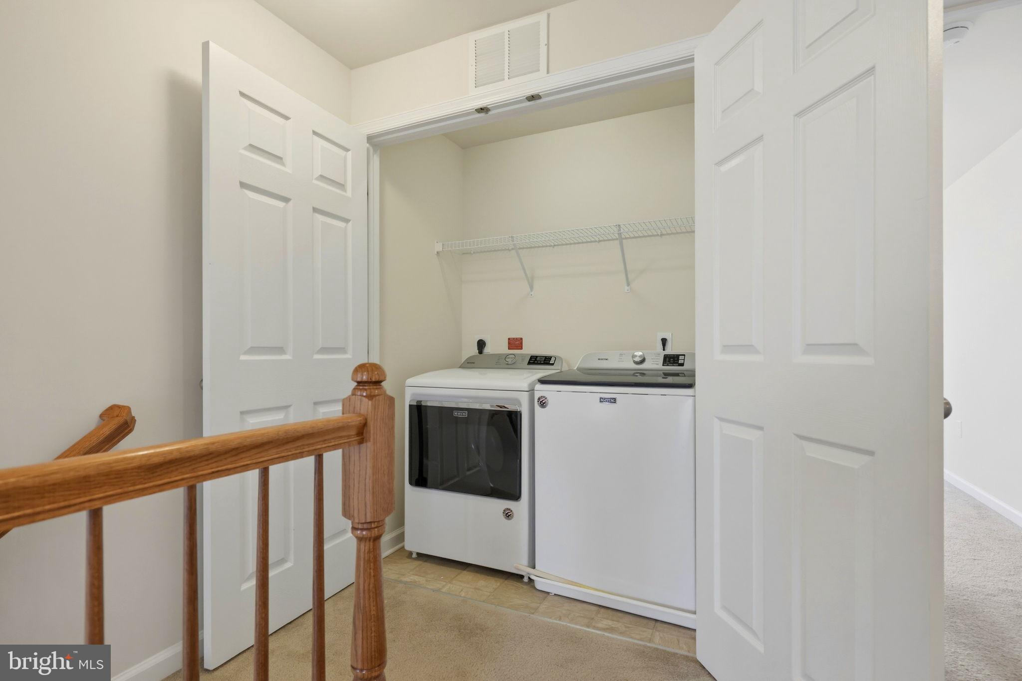 43487 Town Gate Square Chantilly, VA 20152 - Photo 45 of 56 a bathroom with a sink and a mirror