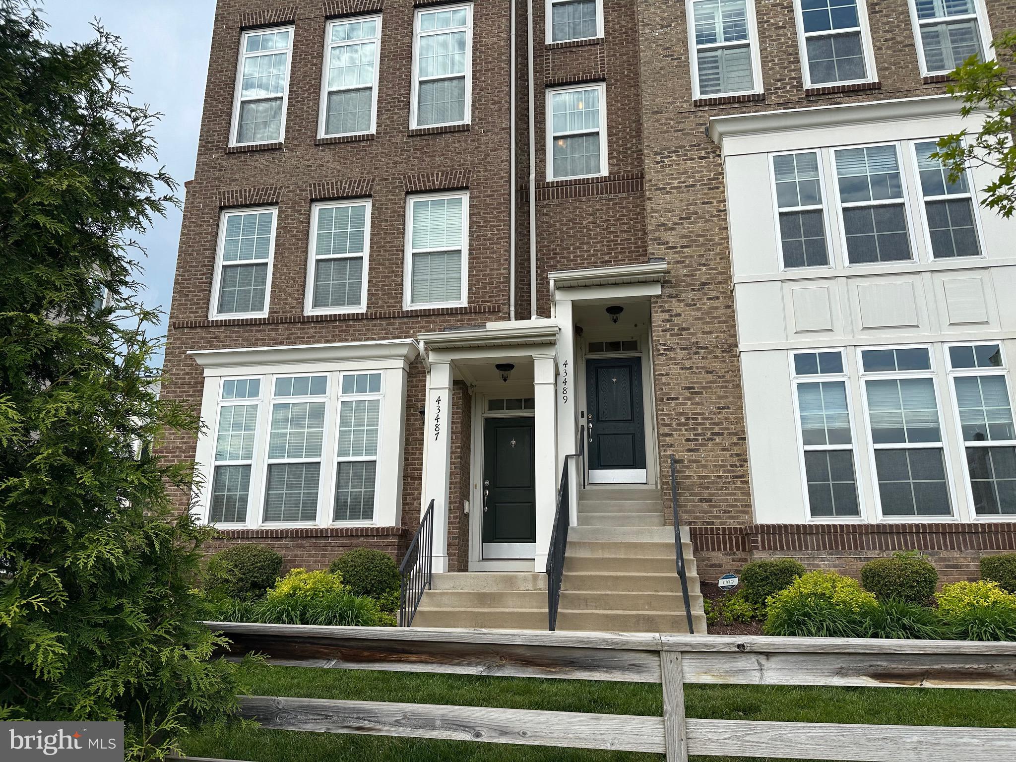 43487 Town Gate Square Chantilly, VA 20152 - Photo 53 of 56 a front view of a multi story residential apartment building