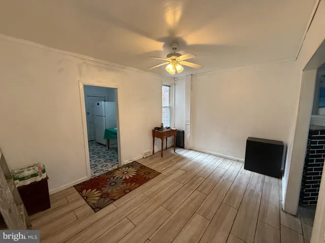 a view of a livingroom with a furniture