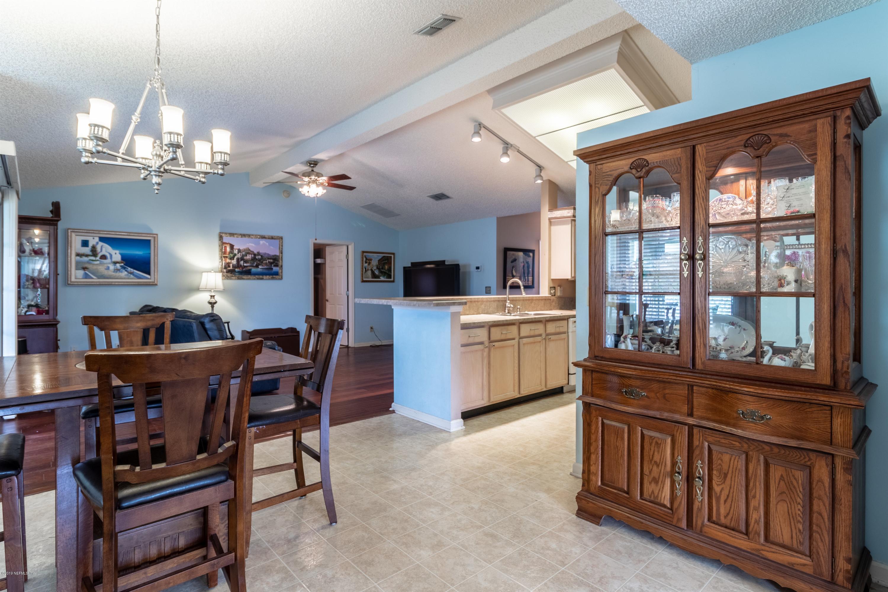 12205 Ridge Forest Lane Jacksonville, FL 32246 - Photo 18 of 36 Breakfast Nook to Family Room