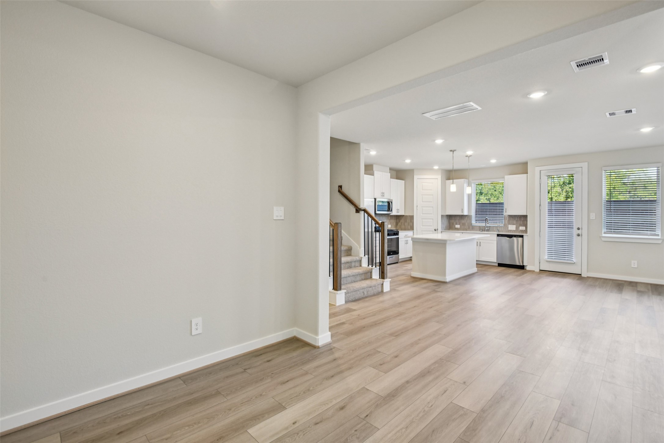 10012 Rustic Charm Street Houston, TX 77080 - Photo 12 of 45 a view of a kitchen with a sink and cabinets
