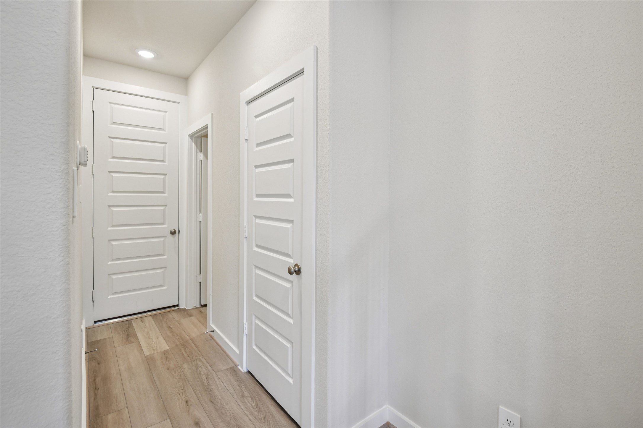 10012 Rustic Charm Street Houston, TX 77080 - Photo 16 of 45 a view of walk in closet with wooden floor